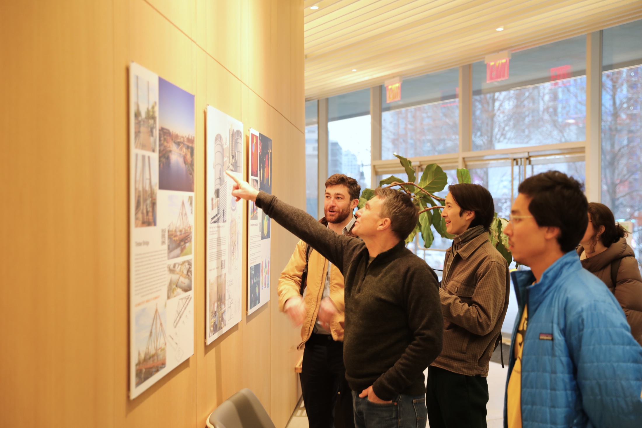 Visitors discussing the Brooklyn NOW! exhibition