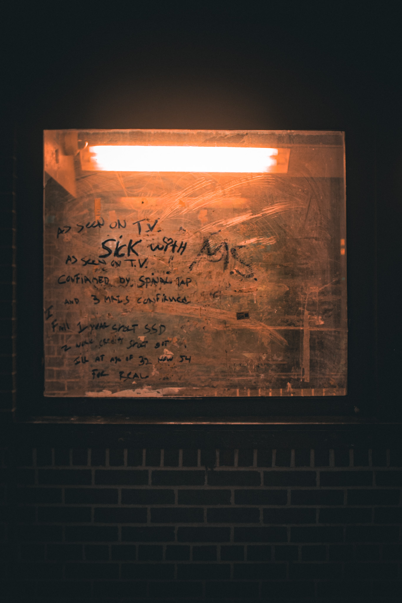 Traces in an illuminated window — photograph by Tony Powers