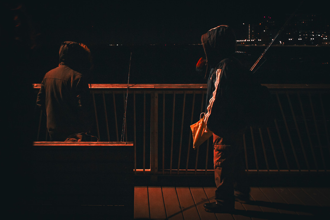 Fishing after dark — photograph by Tony Powers