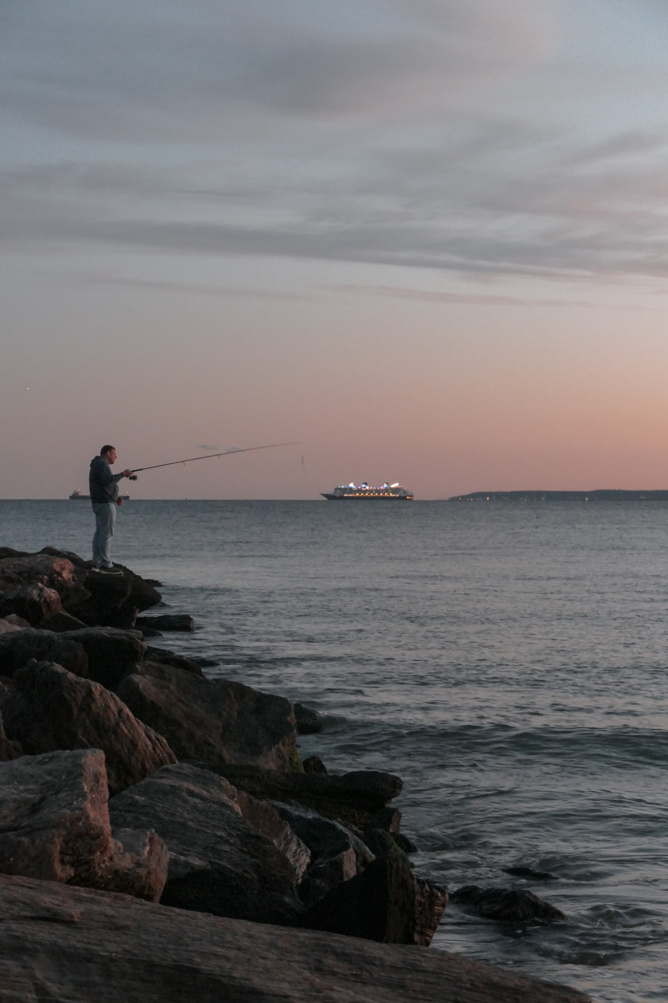 Fishing at sunset — photograph by Tony Powers